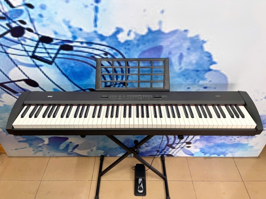 Piano Korg SP-200